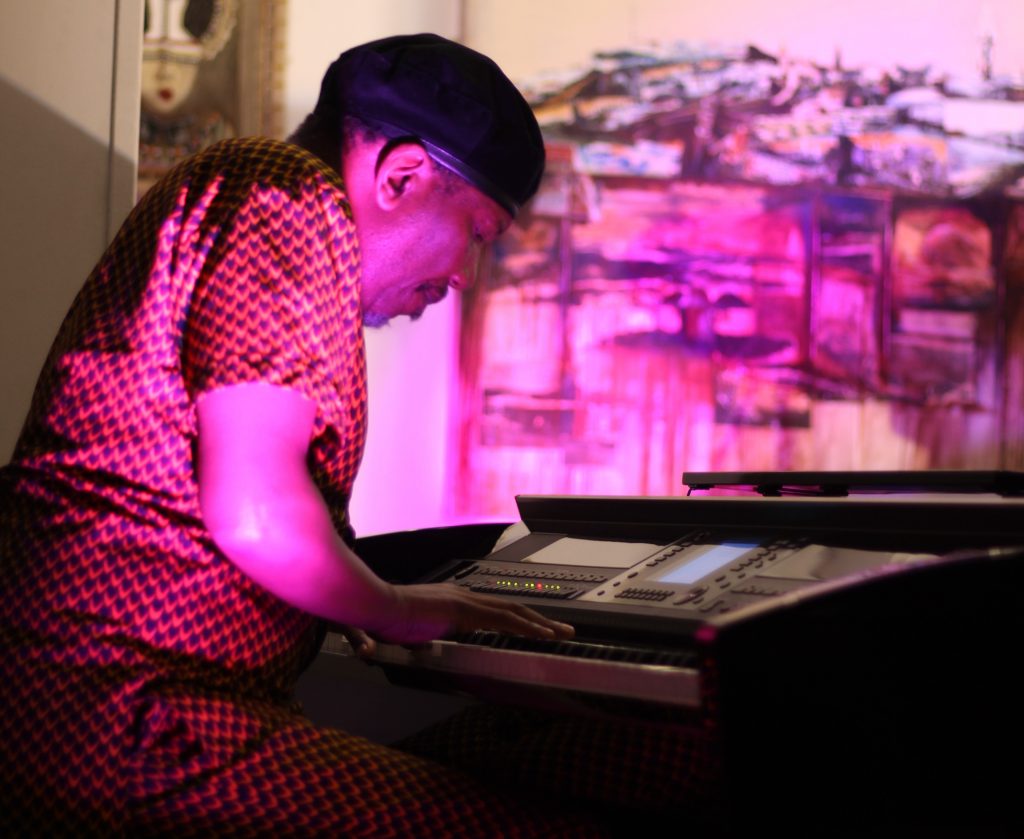 Andile Yenana playing the piano